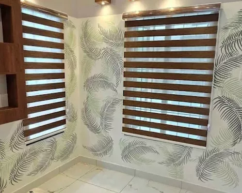 Zebra roller blinds and designer wallpaper installed by M R Venetians in a Chennai home